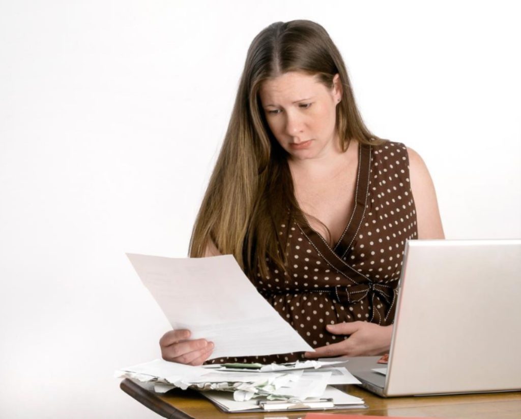 woman stressed looking at docs